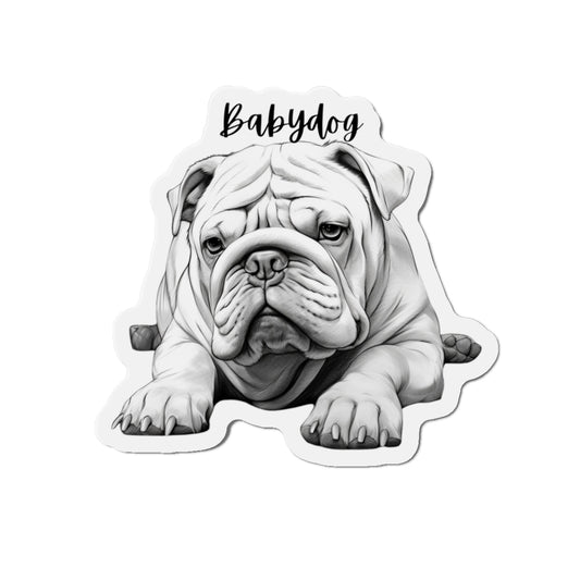 "A set of three fridge magnets featuring cartoon-style bulldogs. Each magnet depicts a different bulldog pose: one sitting with a bone, another lying down with a playful expression, and the third standing with a leash in its mouth. The magnets are colorful and designed to add a fun touch to any metal surface."